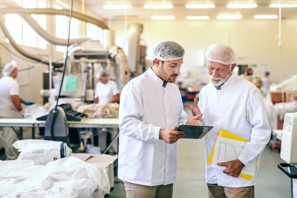 food production workers on factory floor